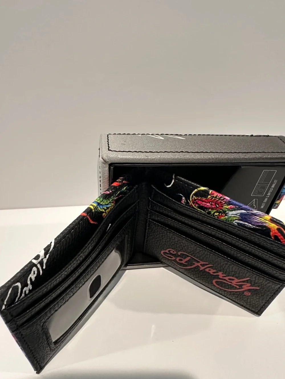 NWT Ed Hardy Men’s Bifold Wallet with Card, ID, Coin and Bill slots.